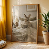 Californian Rabbit Reading in Bed Poster | Modern Gouache Bunny Wall Art | Warm Beige Oat Milk Decor | Cozy Scandinavian Bedroom Print