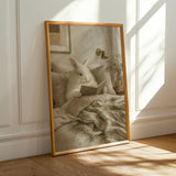 Angora Rabbit Reading in Bed Poster | Scandinavian Gouache Bunny Wall Art | Warm Neutral Nordic Decor | Cozy Minimalist Living Room Print