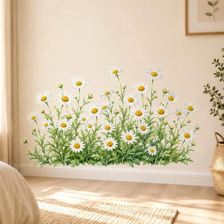 Watercolor wall vinyl decal of a chamomile (kummel) patch with white daisies, yellow centers, green stems, and leafy foliage arranged like a meadow border.