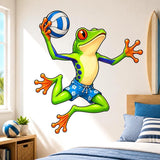 Bright green cartoon frog in blue floral shorts jumping while holding a blue-and-white volleyball, with orange toes and large red eyes on a white background.