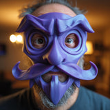 A close-up image of a person wearing a 3D printed, vibrant purple stylized fantasy character mask featuring dramatic arched eyebrows, a sculpted mustache, a pointed nose, and large eye openings.