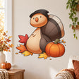 Smiling brown turtle wall decal with a pilgrim-style hat, orange pumpkin and scattered rust, gold and red autumn leaves.