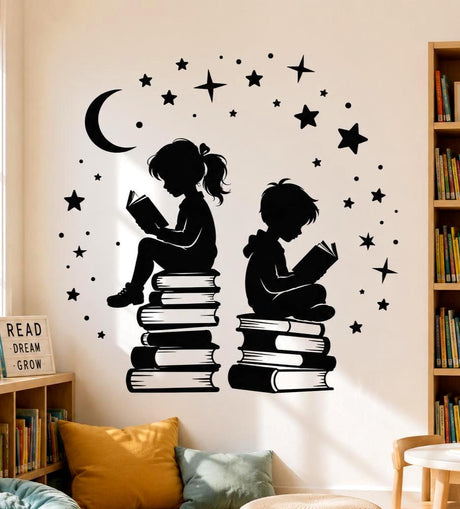 Black silhouette illustration of two children reading books while sitting on tall book stacks, surrounded by a crescent moon, scattered stars, sparkles, and small dots.