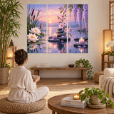 Meditation room wall sticker with water lilies, purple blossoms, smooth dark stones and warm candlelight.