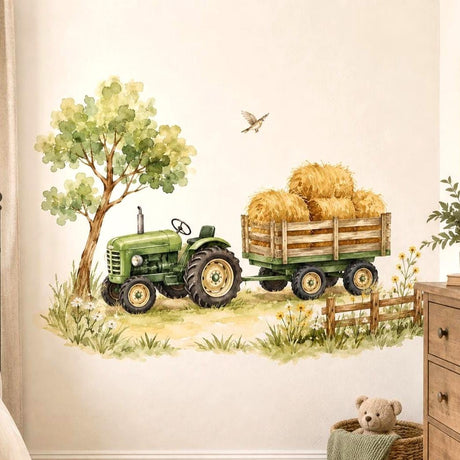 Green tractor pulling a wooden trailer of golden hay bales beside a leafy tree, fence and wildflowers in a watercolor-style farm scene.