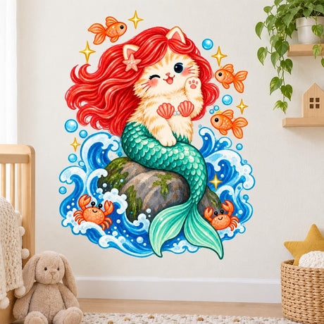 Cream mermaid cat with red hair and a turquoise-green tail on a rock, surrounded by blue waves, fish, crabs and bubbles.
