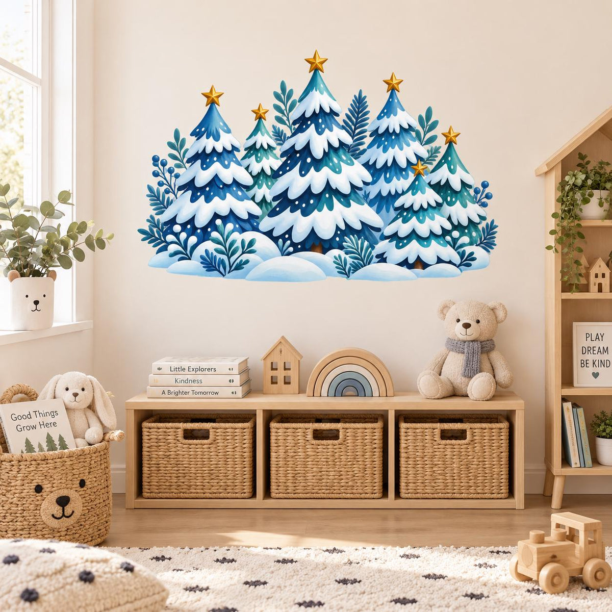 Blue and teal Christmas tree wall sticker featuring snow-covered evergreens and scattered golden stars.