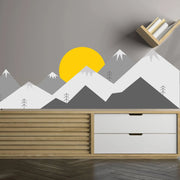 Stunning mountain wall decal with sun on a modern interior wall.