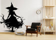 Fantasy figure silhouette and stylized flame vinyl wall decal in a modern interior.