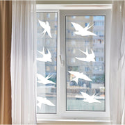 Bird safety window decals by FeatherGuard displayed on a window, enhancing home aesthetics and protecting wildlife.
