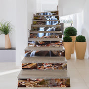 Stair riser vinyl decals featuring a serene waterfall design, enhancing the staircase decor in a modern home.